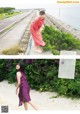 A woman in a pink dress standing on the side of a road.