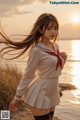 A woman in a school uniform standing by the water.